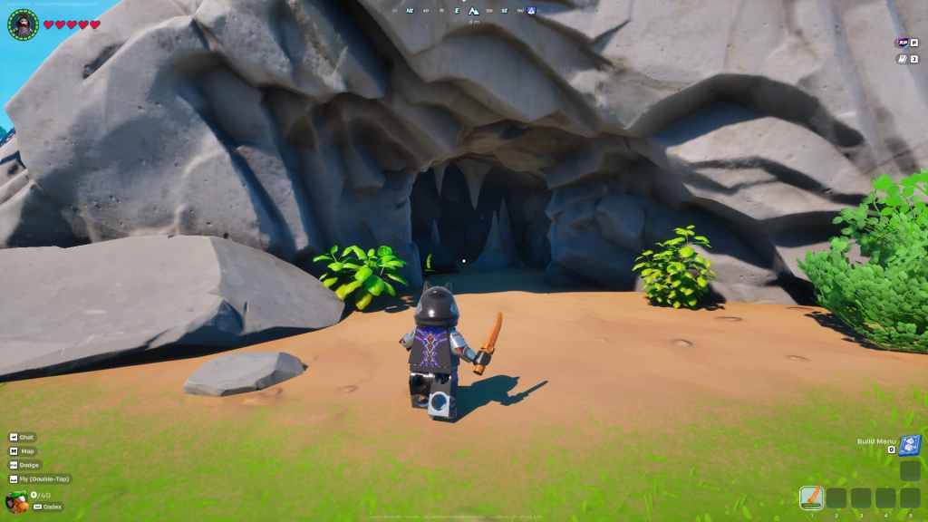 Entrada da caverna em Lego Fortnite.